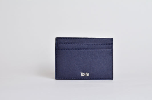 Sustainable fashion accessory: Tashi SARL's navy cactus leather cardholder. Front view
